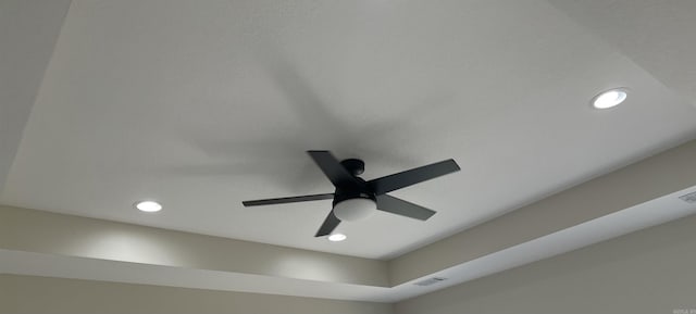 details with a ceiling fan, recessed lighting, and visible vents