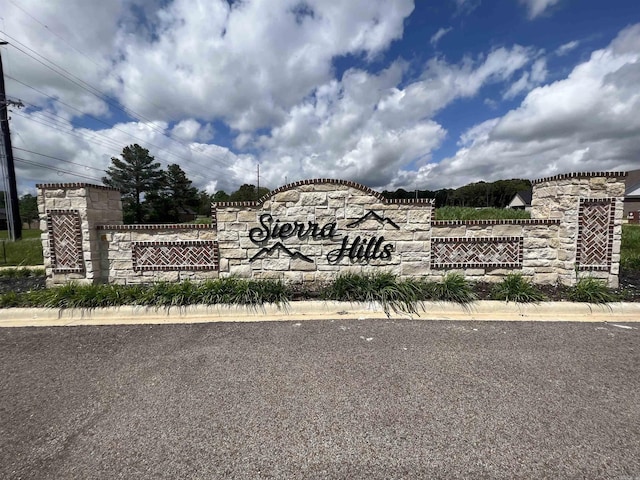 view of community sign