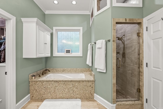 bathroom with a garden tub, crown molding, baseboards, recessed lighting, and a shower stall