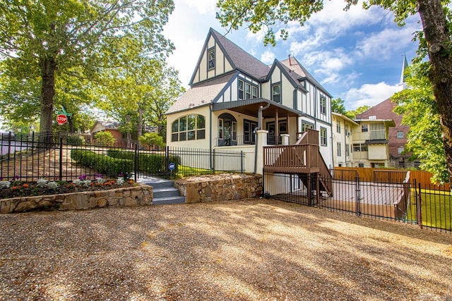 exterior space with fence private yard and roof with shingles
