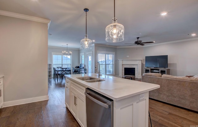 10 Luke Ct, Maumelle, AR 72113 - kitchen with stainless steel dishwasher, a fireplace, a sink, ceiling fan with notable chandelier, and ornamental molding