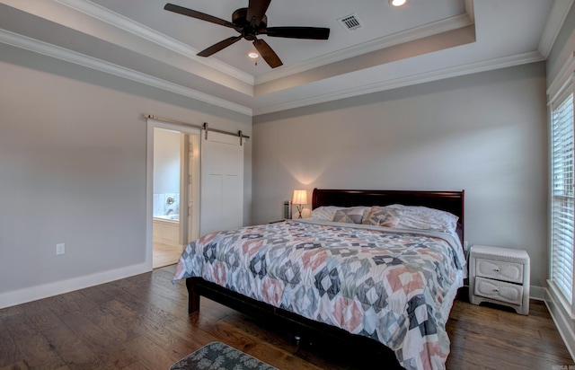 10 Luke Ct, Maumelle, AR 72113 - bedroom with wood finished floors, a tray ceiling, a barn door, and visible vents