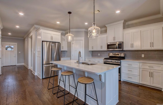 10 Luke Ct, Maumelle, AR 72113 - kitchen with visible vents, a sink, light countertops, a breakfast bar, and stainless steel appliances