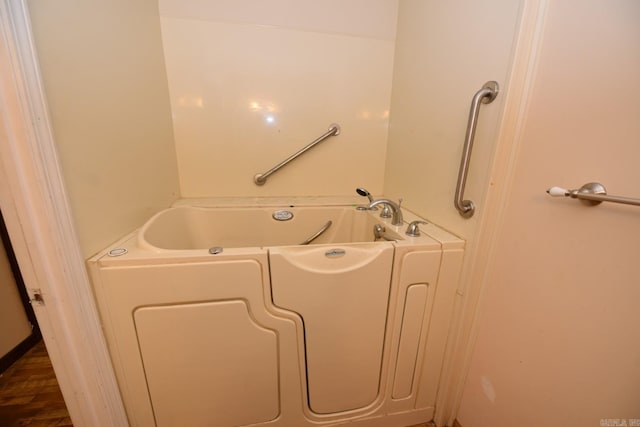 full bath featuring a tub