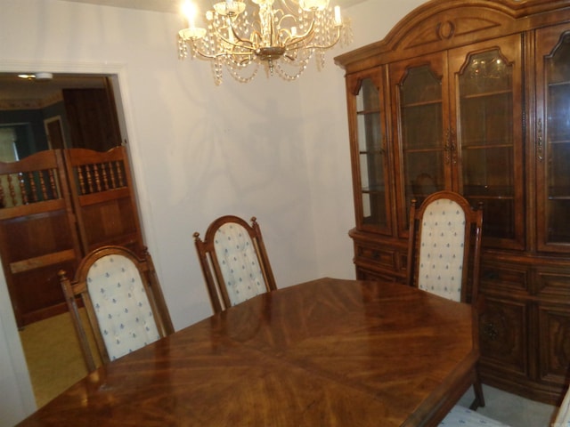 dining room with a chandelier