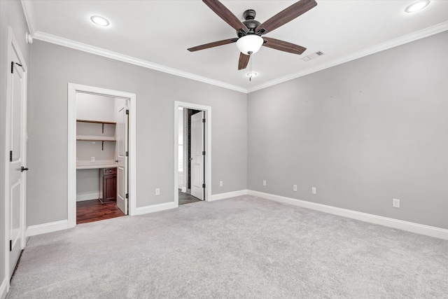 5485 Viney Creek Ln, Jonesboro, AR 72404 - unfurnished bedroom featuring carpet floors, crown molding, baseboards, connected bathroom, and recessed lighting