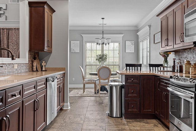 5485 Viney Creek Ln, Jonesboro, AR 72404 - kitchen featuring a sink, appliances with stainless steel finishes, a chandelier, decorative backsplash, and ornamental molding