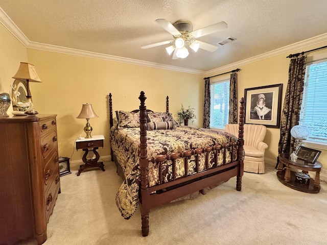 bedroom featuring baseboards, ornamental molding, light colored carpet, and visible vents