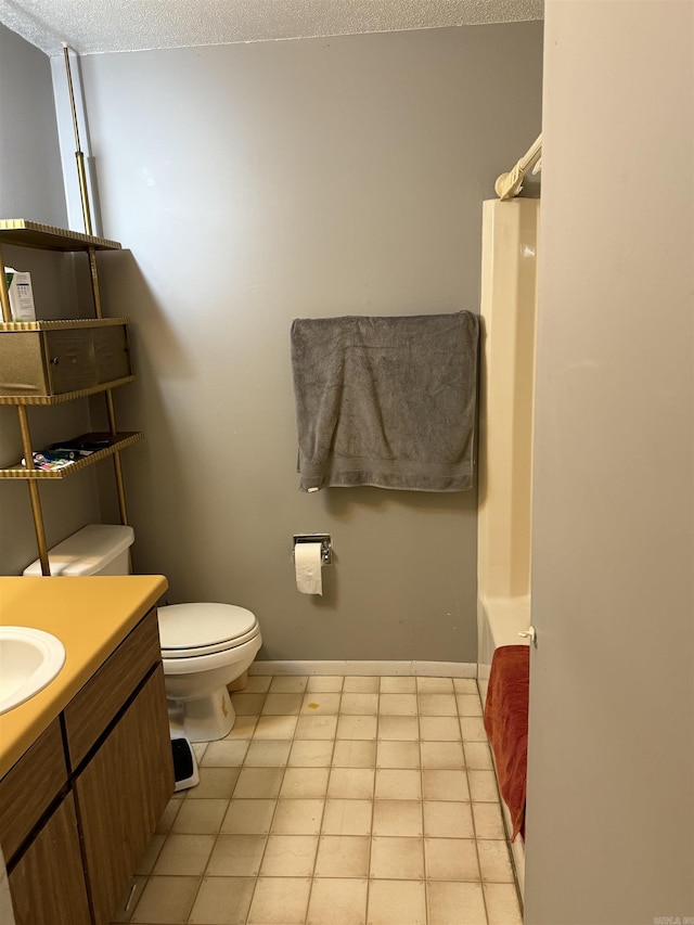 bathroom with a tub, a textured ceiling, a shower, vanity, and toilet