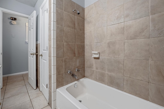 718 W 41st St, North Little Rock, AR 72118 - full bath with shower / tub combination, baseboards, and tile patterned floors