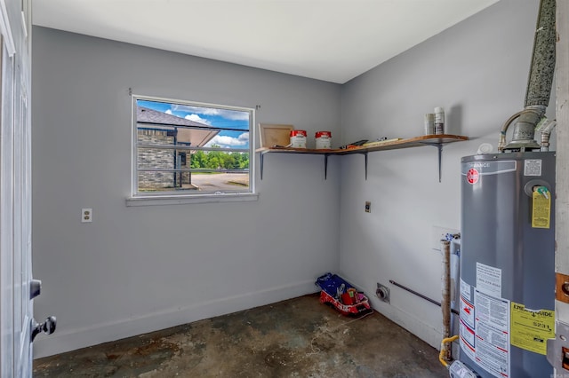 718 W 41st St, North Little Rock, AR 72118 - laundry room featuring water heater, hookup for an electric dryer, baseboards, and laundry area