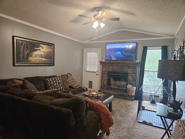 living area featuring a ceiling fan, a textured ceiling, vaulted ceiling, a fireplace, and carpet floors