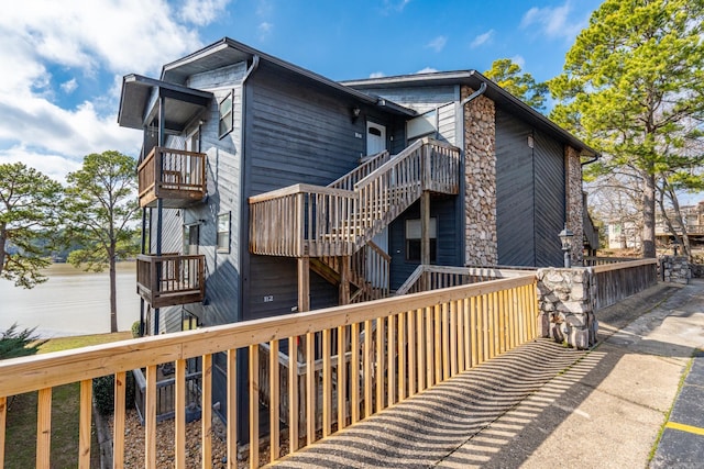 203 Stearns Pt Unit B6, Lake Hamilton, AR 71913 - back of property featuring stairway and a balcony