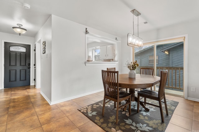 203 Stearns Pt Unit B6, Lake Hamilton, AR 71913 - tiled dining space featuring baseboards and a chandelier