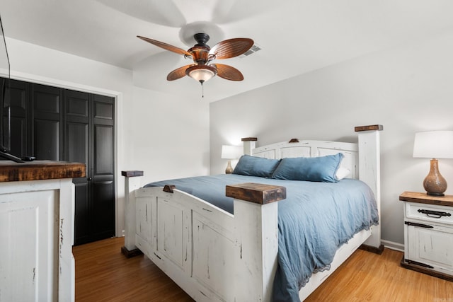 203 Stearns Pt Unit B6, Lake Hamilton, AR 71913 - bedroom featuring a ceiling fan, baseboards, visible vents, and light wood finished floors