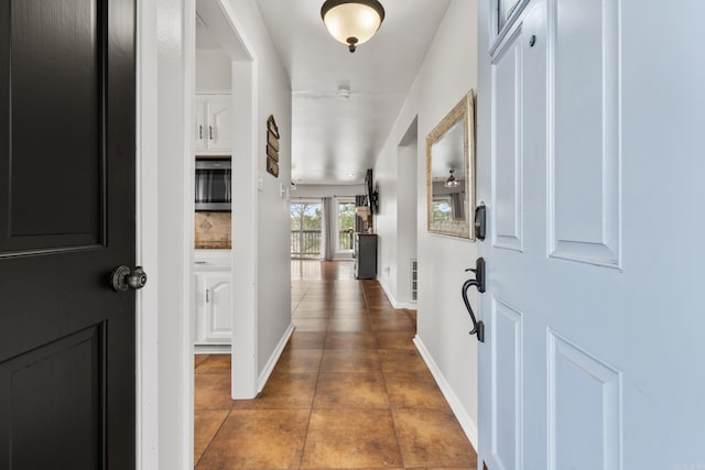 203 Stearns Pt Unit B6, Lake Hamilton, AR 71913 - foyer with baseboards and tile patterned flooring