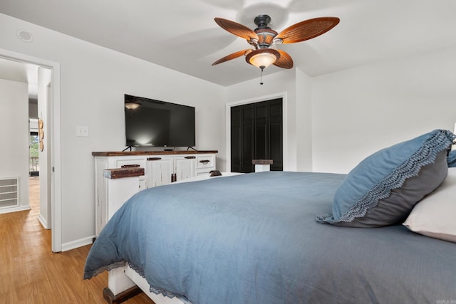 203 Stearns Pt Unit B6, Lake Hamilton, AR 71913 - bedroom with baseboards, visible vents, ceiling fan, and light wood finished floors