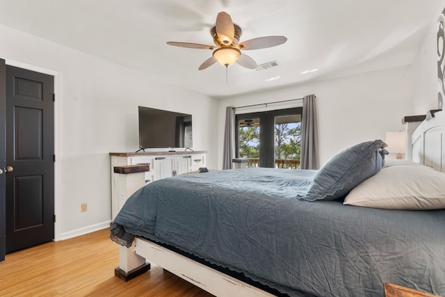 203 Stearns Pt Unit B6, Lake Hamilton, AR 71913 - bedroom with a ceiling fan, visible vents, wood finished floors, baseboards, and access to outside