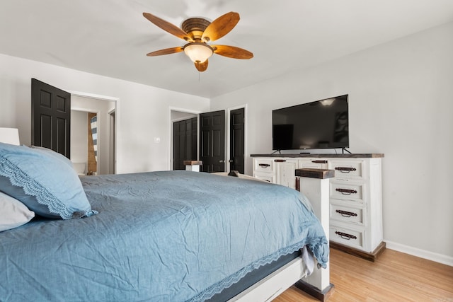 203 Stearns Pt Unit B6, Lake Hamilton, AR 71913 - bedroom with baseboards, a ceiling fan, and light wood finished floors