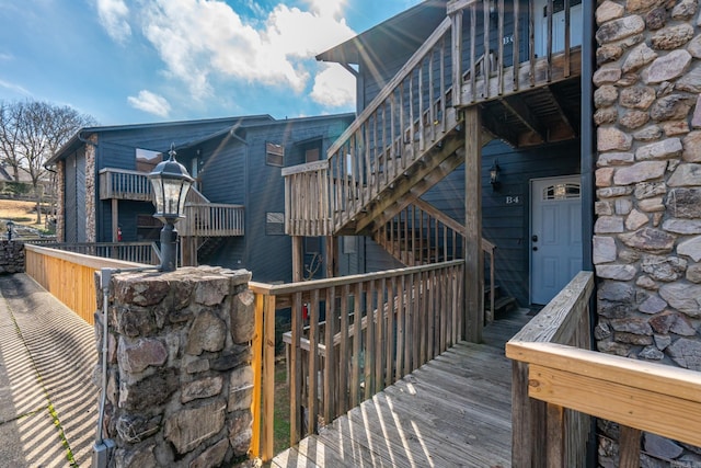 203 Stearns Pt Unit B6, Lake Hamilton, AR 71913 - exterior space with stairs and stone siding
