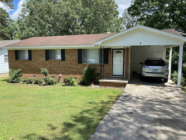 ranch-style home with roof with shingles, brick siding, a front yard, crawl space, and concrete driveway