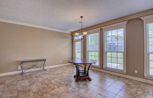unfurnished dining area with baseboards, crown molding, a notable chandelier, and visible vents