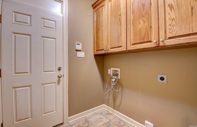 laundry area with cabinet space, washer hookup, marble finish floor, baseboards, and hookup for an electric dryer