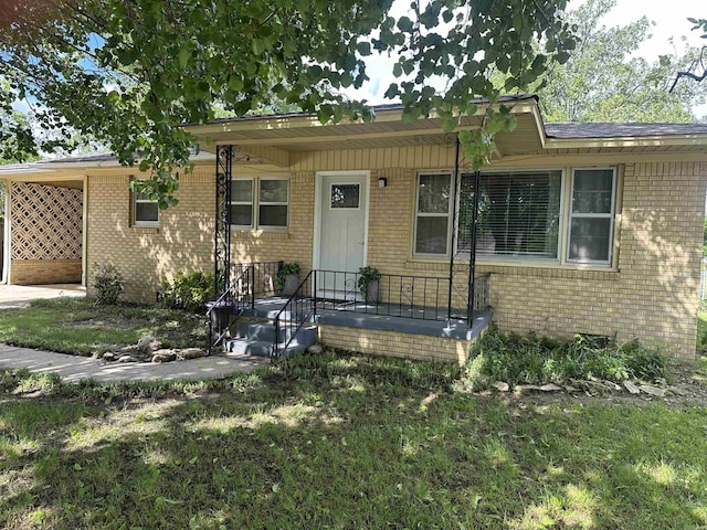 view of front of house with brick siding