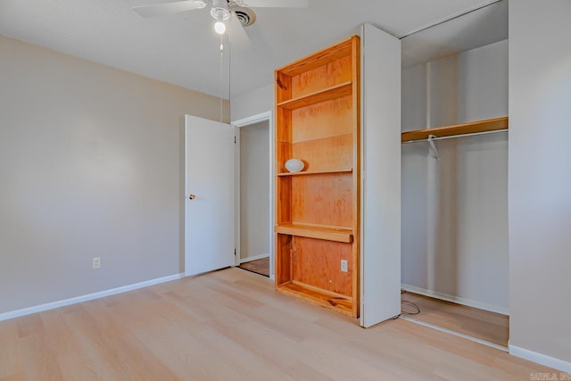 3210 Kingsbury St, Jonesboro, AR 72401 - unfurnished bedroom with a closet, baseboards, and wood finished floors