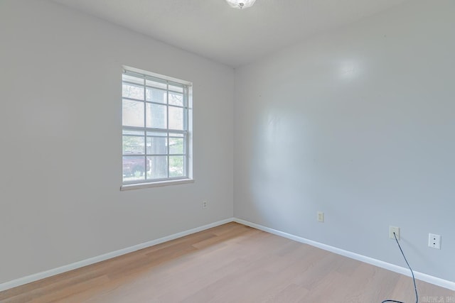 3210 Kingsbury St, Jonesboro, AR 72401 - empty room with light wood-type flooring and baseboards
