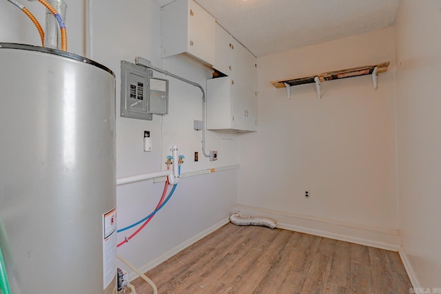 3210 Kingsbury St, Jonesboro, AR 72401 - utility room featuring water heater and electric panel
