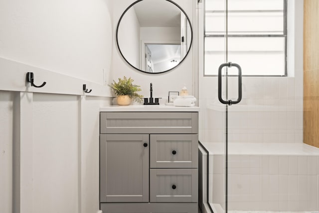 full bathroom featuring vanity and a stall shower