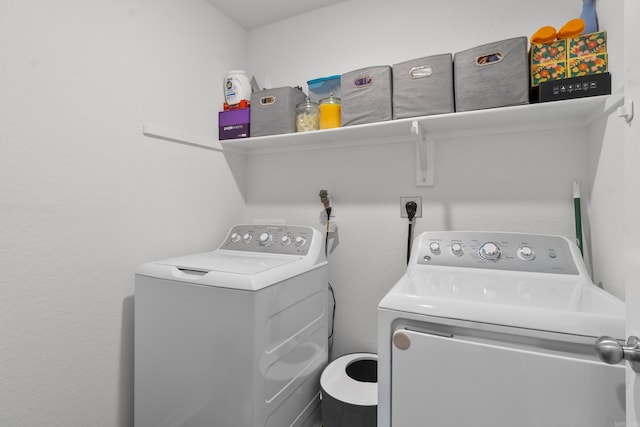 laundry area featuring laundry area and washing machine and clothes dryer