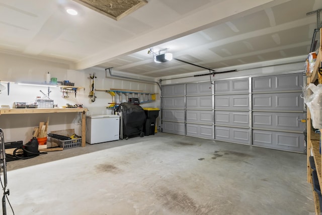 garage featuring a garage door opener and refrigerator