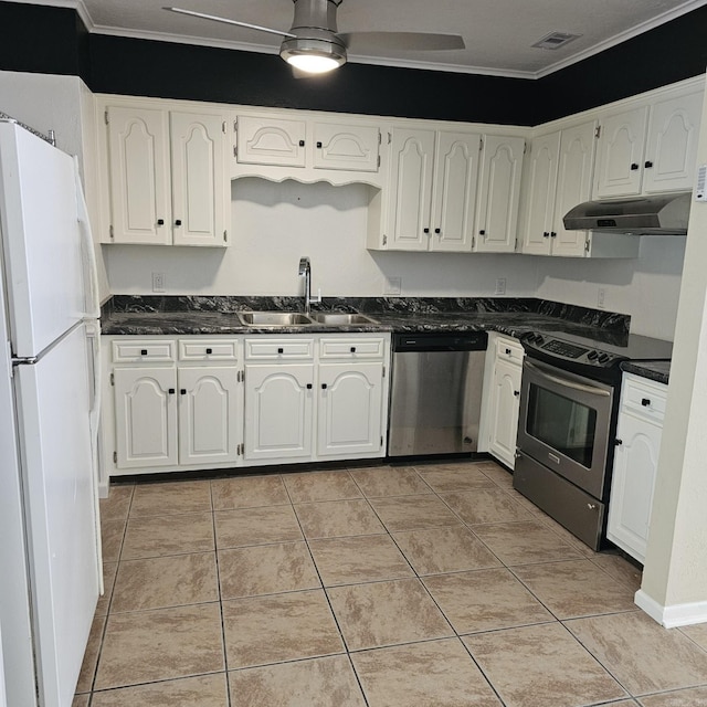 kitchen with a sink, appliances with stainless steel finishes, ornamental molding, and under cabinet range hood
