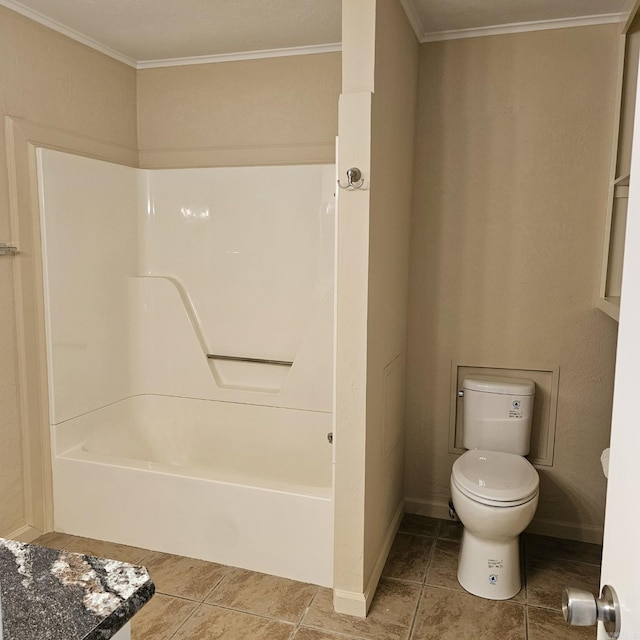 bathroom featuring crown molding, toilet, baseboards, tile patterned floors, and  shower combination