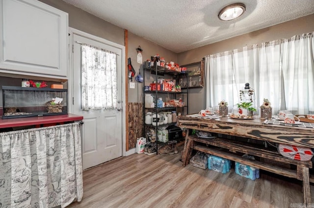 6322 US Highway 278, Rosston, AR 71858 - dining room with a textured ceiling and light wood-type flooring