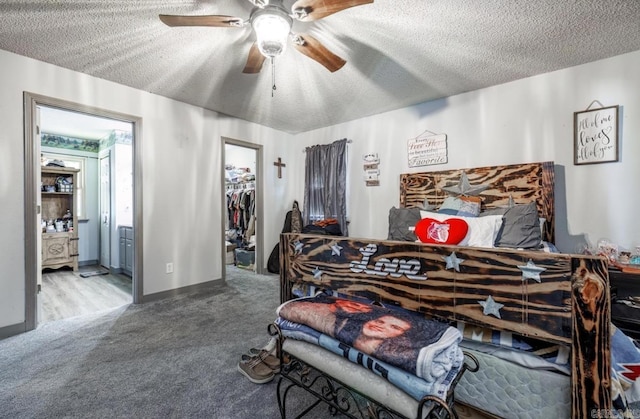 6322 US Highway 278, Rosston, AR 71858 - bedroom featuring a ceiling fan, a walk in closet, carpet, and ensuite bath