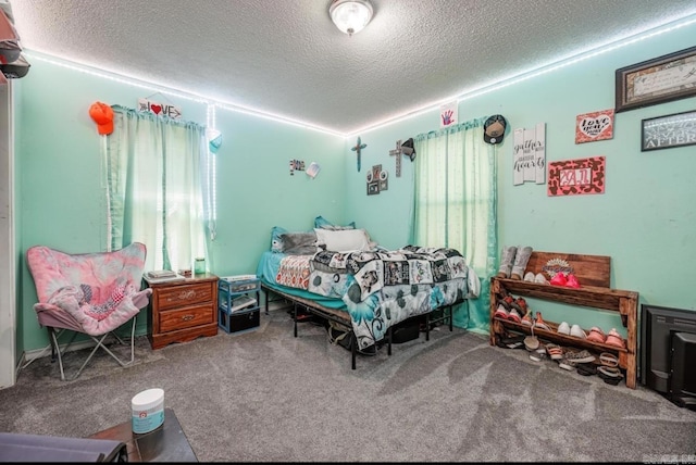 6322 US Highway 278, Rosston, AR 71858 - bedroom with a textured ceiling and carpet