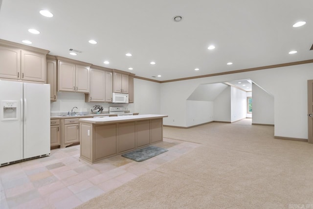 kitchen with a center island, ornamental molding, white appliances, a sink, and light countertops