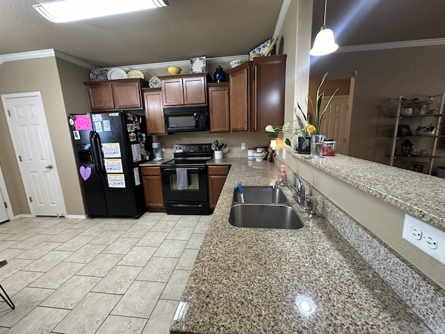 kitchen with crown molding, light countertops, black appliances, and a sink