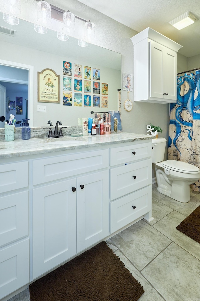 full bathroom with toilet, tile patterned flooring, vanity, and visible vents