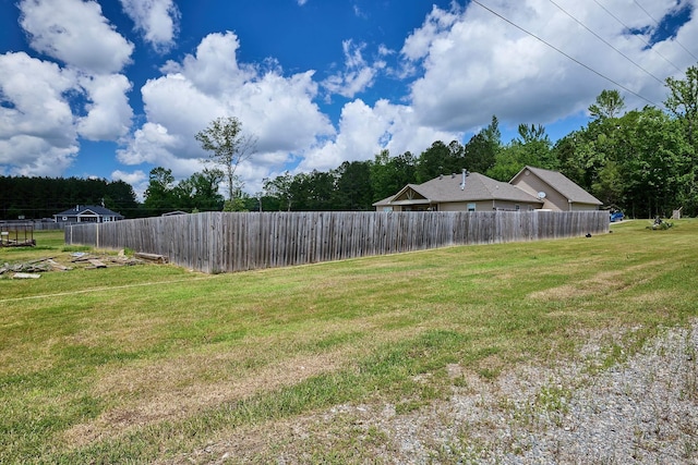 view of yard with fence