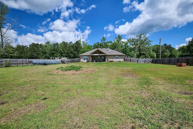 view of yard featuring a fenced backyard