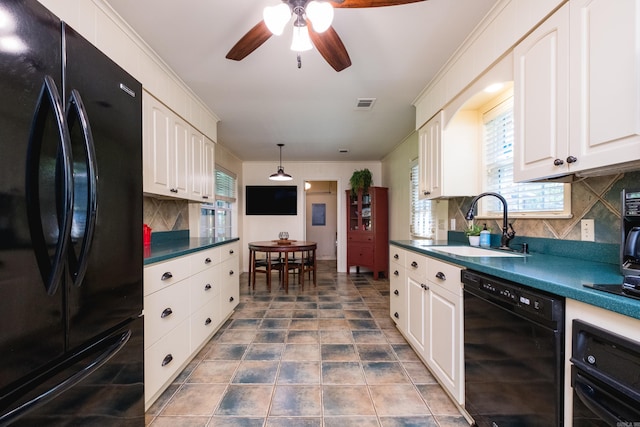kitchen with a ceiling fan, visible vents, a sink, black appliances, and tasteful backsplash
