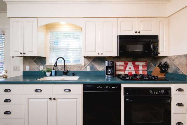kitchen featuring a sink, white cabinetry, black appliances, dark countertops, and tasteful backsplash
