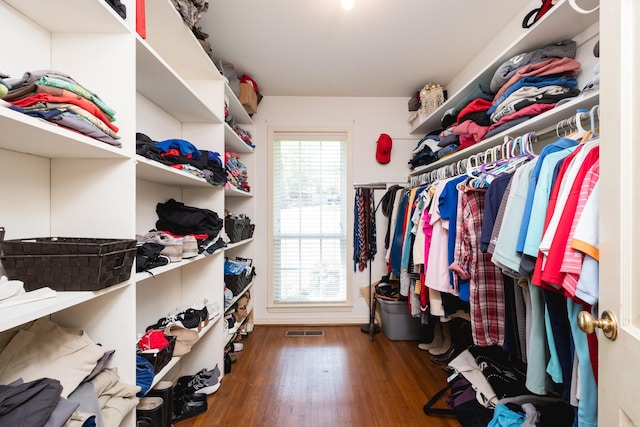 spacious closet featuring wood finished floors