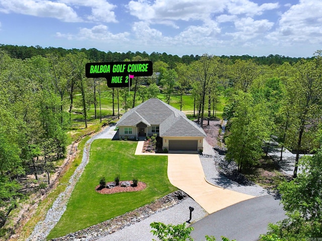 aerial view featuring a view of trees