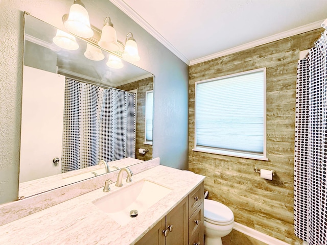 bathroom featuring toilet, vanity, crown molding, and a shower with shower curtain