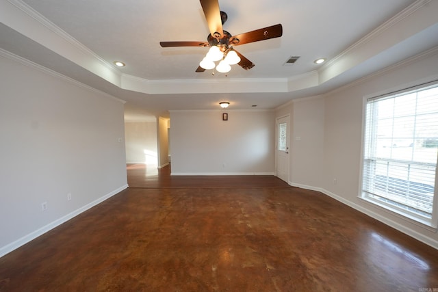 empty room with baseboards, ceiling fan, finished concrete flooring, and visible vents